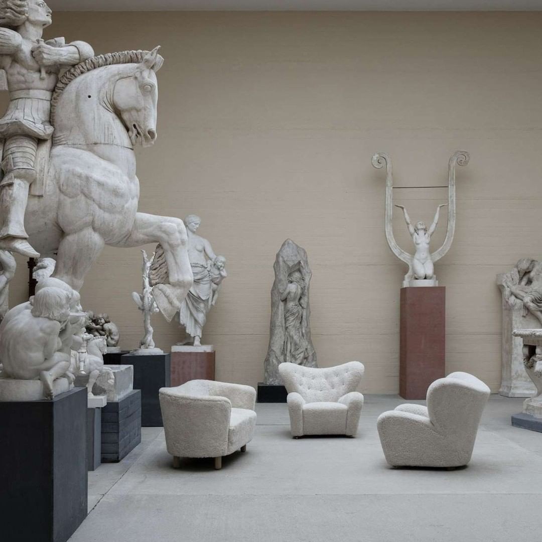 An Instagram  post added on Jan 24, 2024. The author is @klaus_showroom. May present: stone carving, the tired man, furniture, interior design, bylassen the tired man lounge chair.