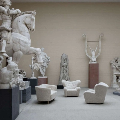 An Instagram  post added on Jan 24, 2024. The author is @klaus_showroom. May present: stone carving, the tired man, furniture, interior design, bylassen the tired man lounge chair.