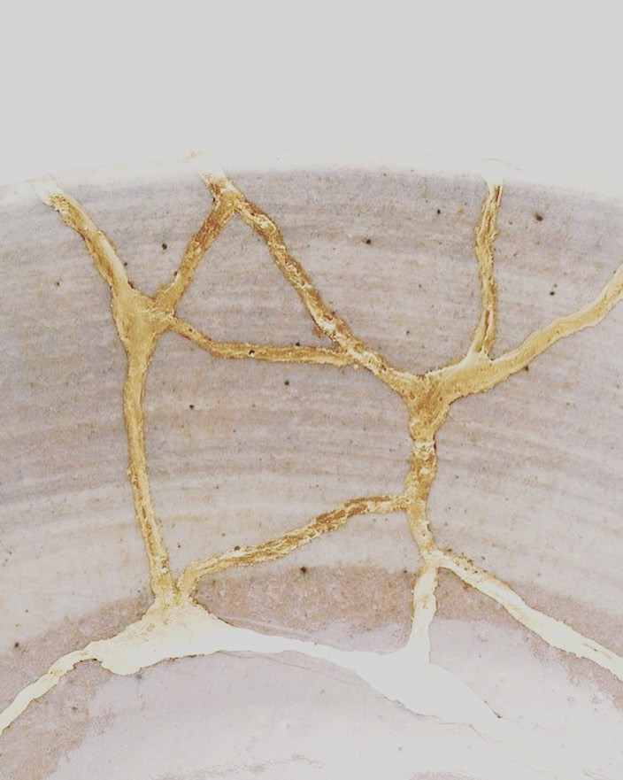 A ceramic object repaired using the Japanese art of Kintsugi. Photo by Ombre Claire.