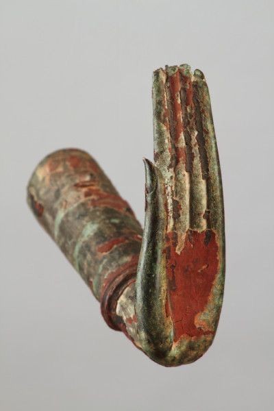 A sculpture of the Abhaya Mudra, a gesture symbolizing protection, peace, and fearlessness.