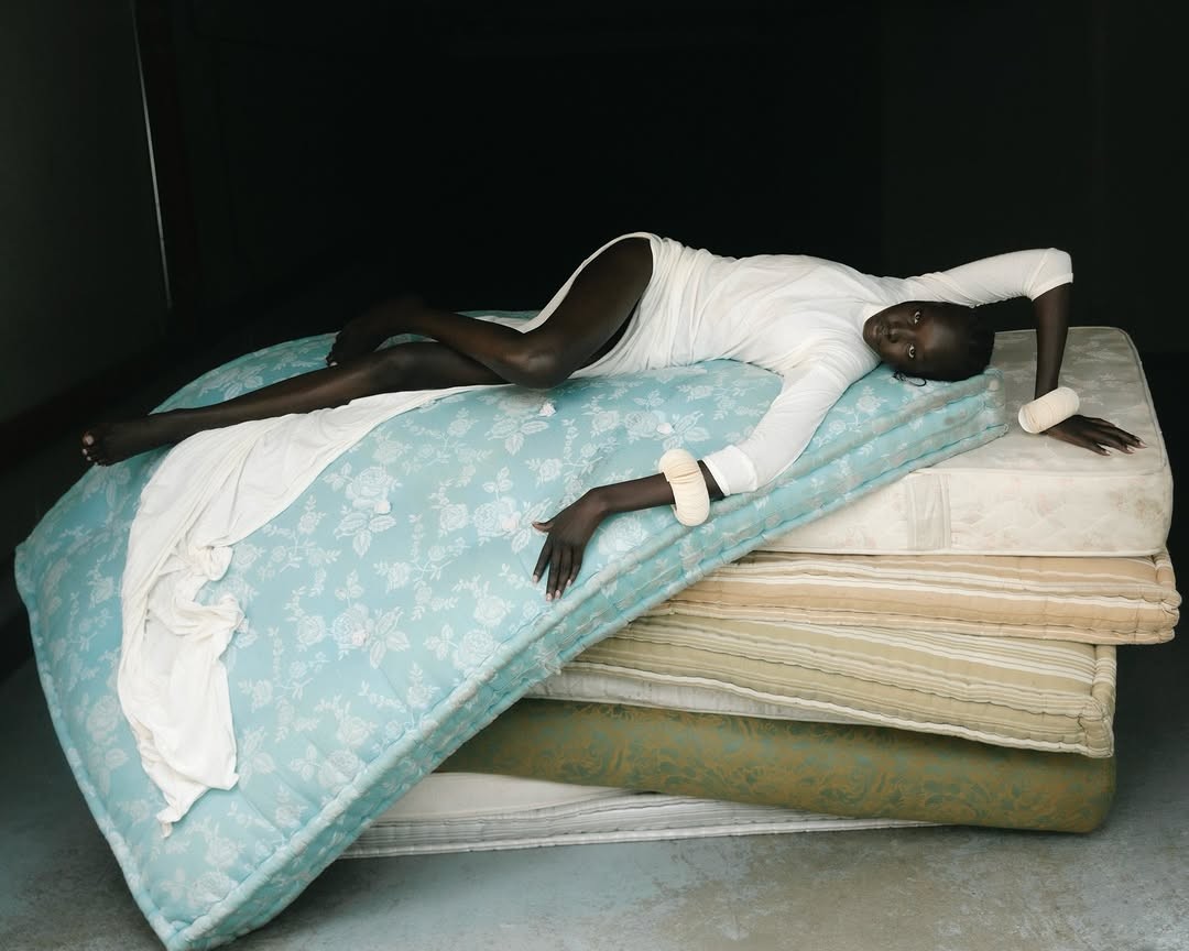 Model Akuol in "Insomniac Sleepover" for Behaving Magazine, with art direction by Noor Massoud.