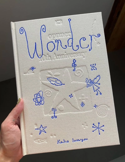 Cover of the Wonder 10th anniversary book for brand OPNNER