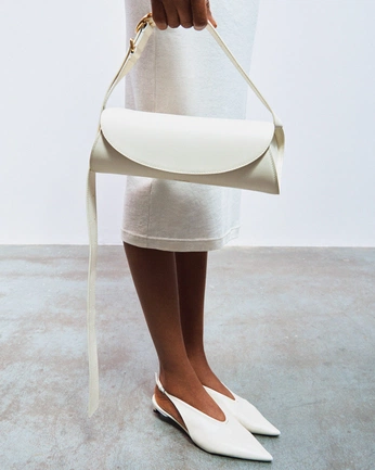 A cover of "Attire" cluster. The owner is brooke.shap. The cluster consists of 5 elements.