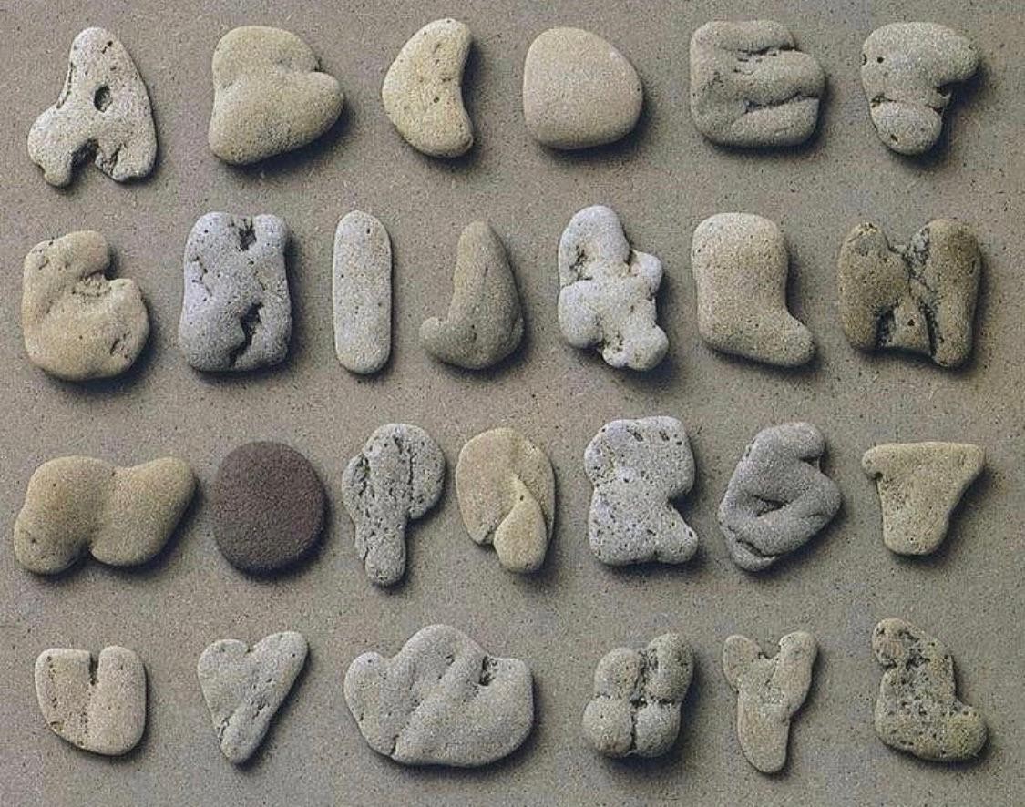 The Collected Stone Alphabet by artist Clotilde Olyff, made from naturally-shaped stones.