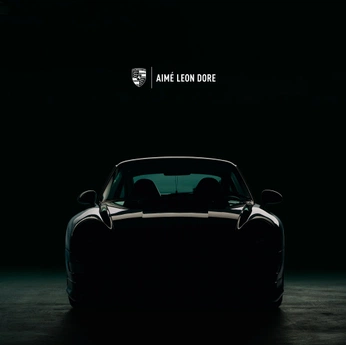 A cover of "Aimé Leon Dore x Porsche" cluster. The owner is numi. The cluster consists of 23 elements.