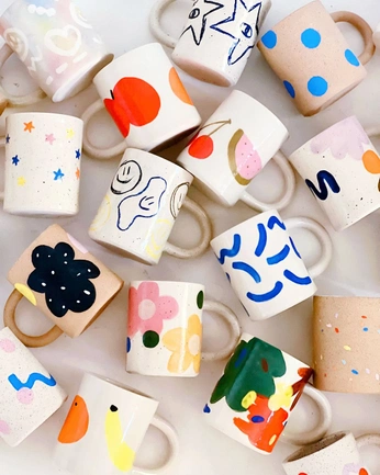 A cover of "Design Mugs" cluster. The owner is hardbody. The cluster consists of 36 elements.