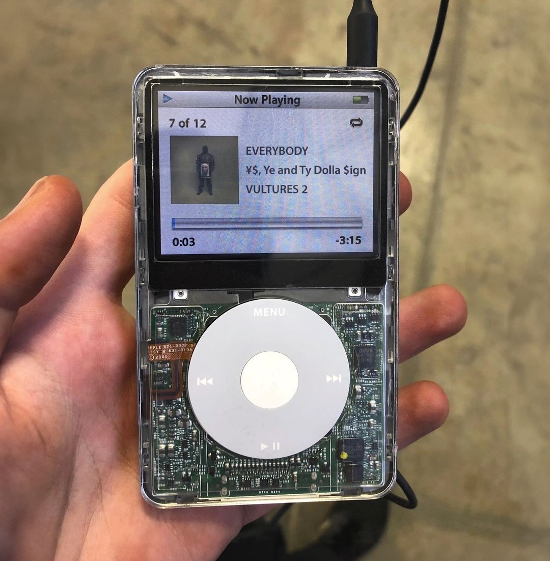 A modified iPod Classic 5th Generation plays "Everybody" by ¥$ (Ye and Ty Dolla Sign).