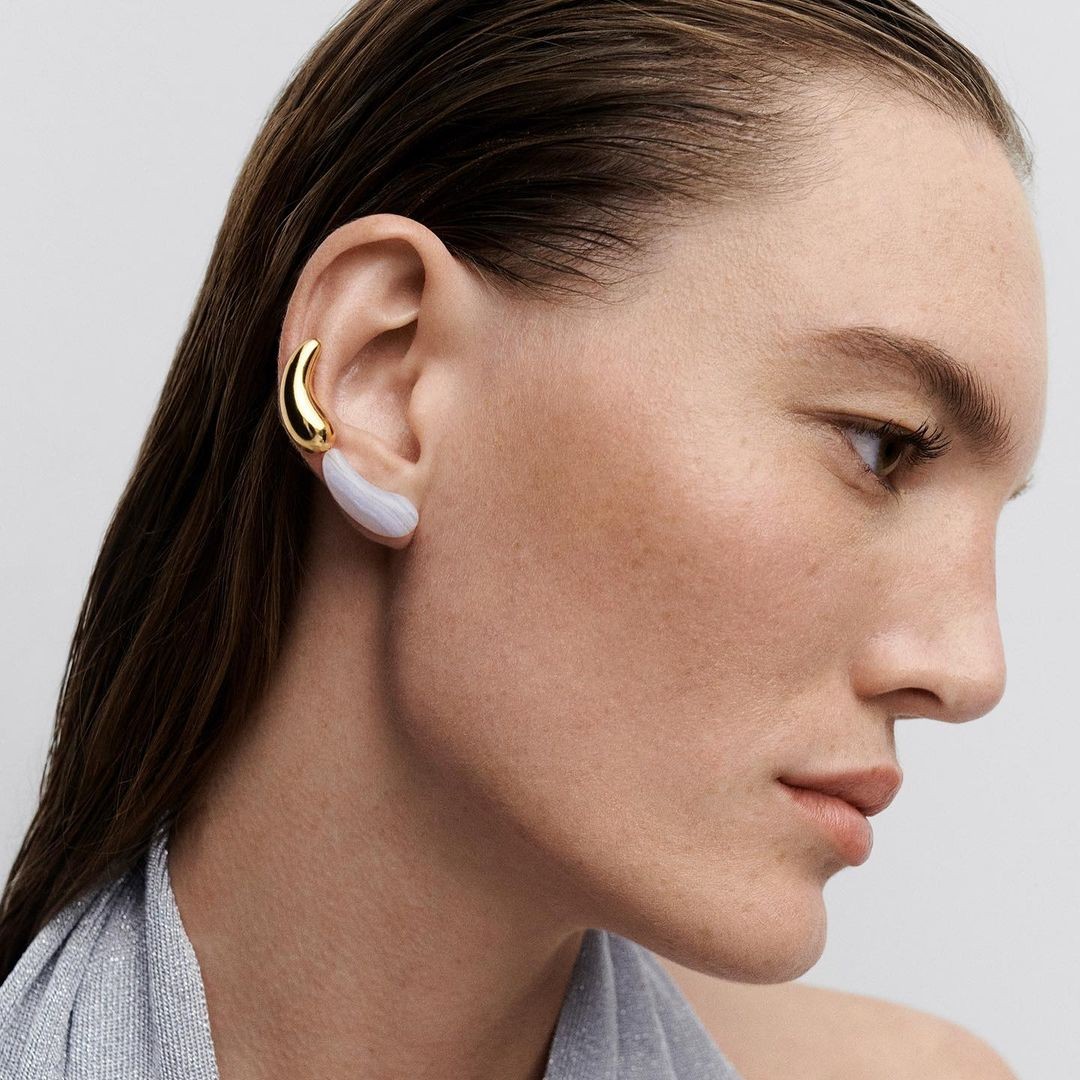 An earring from the Aqua collection by PDPAOLA, featuring blue agate.