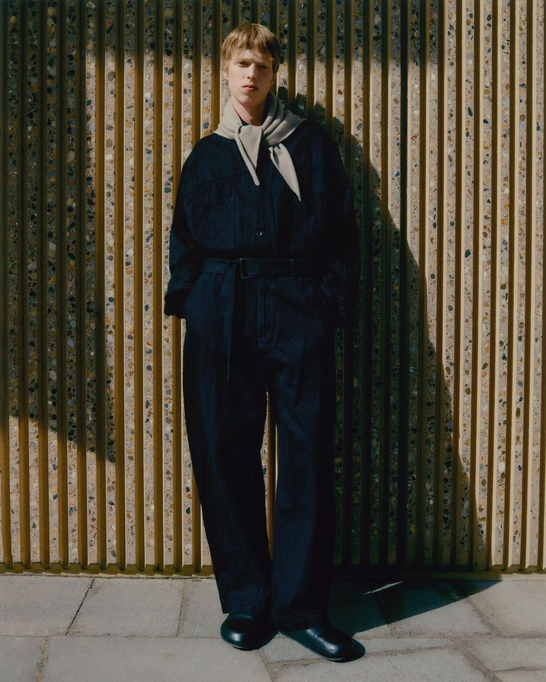 Model Erik J for the Studio Nicholson Autumn 2024 campaign, photographed by Ben Beagent.