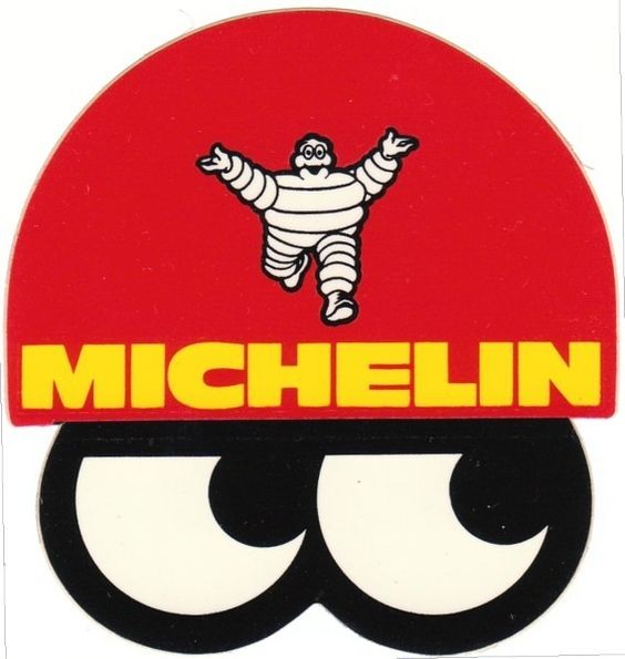 A vintage sticker featuring Bibendum, the mascot for the tire company Michelin.