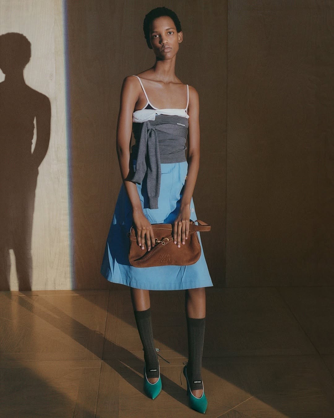 A look from the Miu Miu Spring/Summer 2025 collection by creative director Miuccia Prada.
