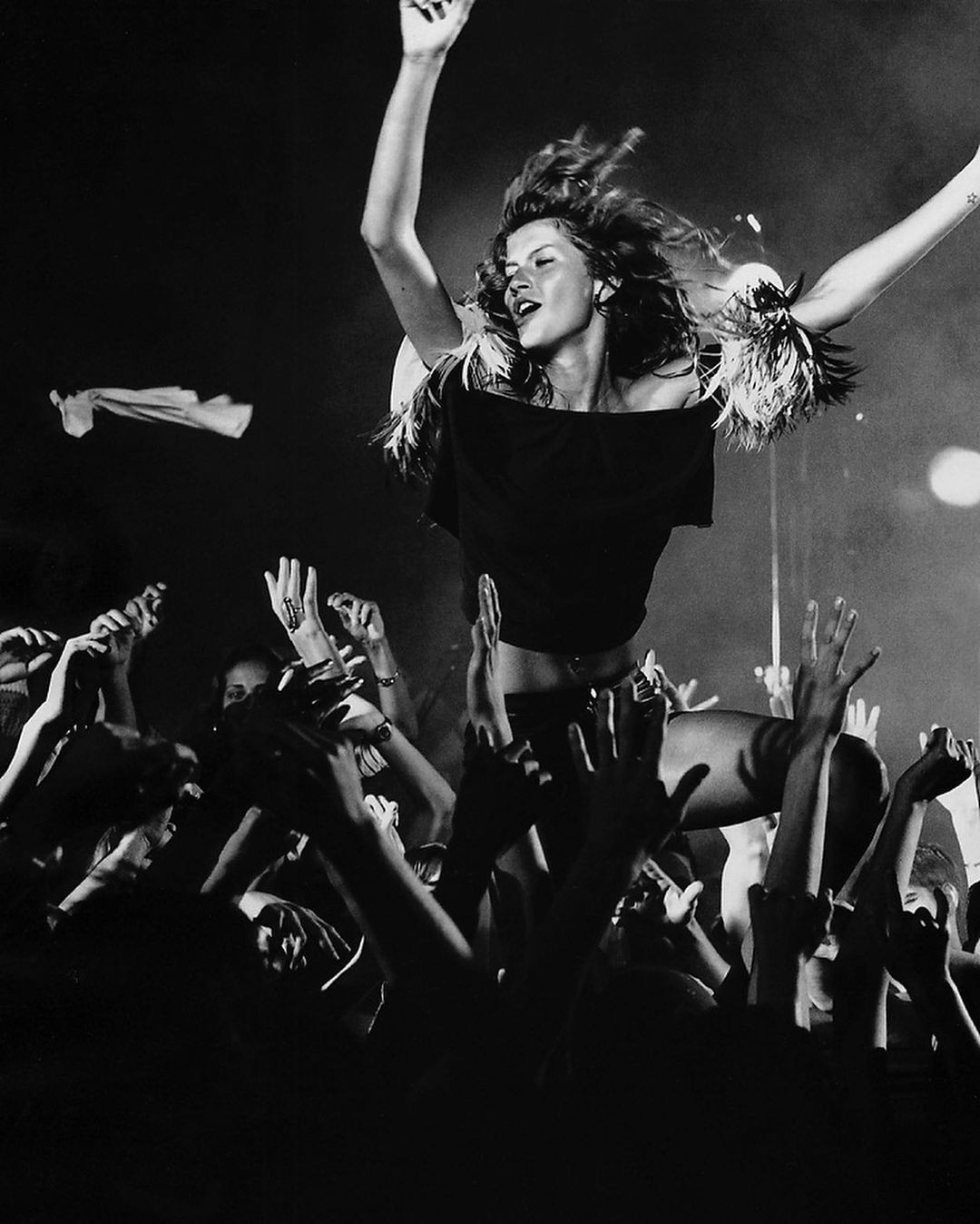 An Instagram  post added on May 06, 2024. The author is @gisele. May present: patrick demarchelier gisele, gisele bündchen, band plays, musician, flash photography.