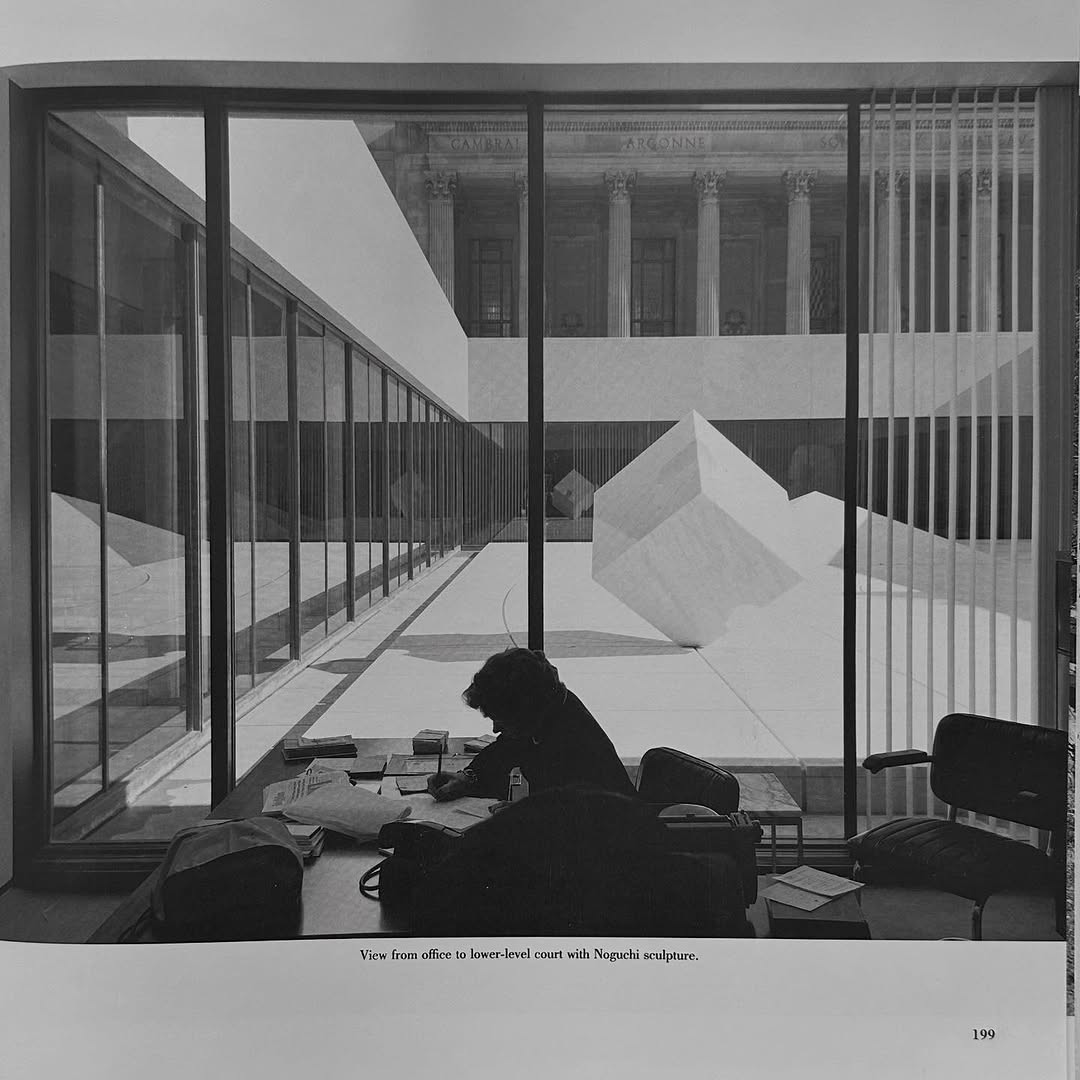 View of Isamu Noguchi's sculpture courtyard from the reading room of a Gordon Bunshaft-designed building.