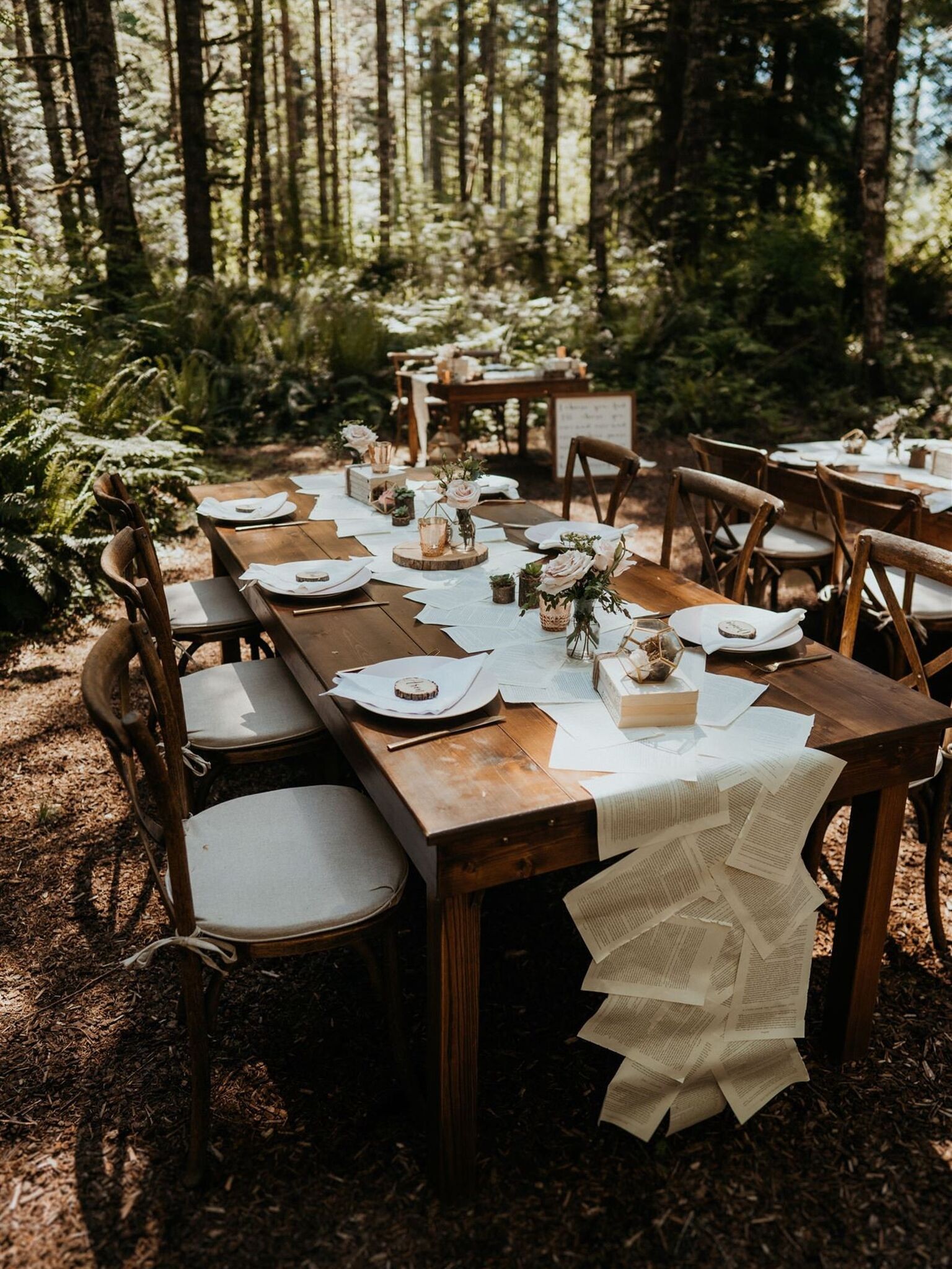 Book-themed decor by The Bubbly Soirée for the wedding of Annie and Will. Photo by Sarah Anne Photo.