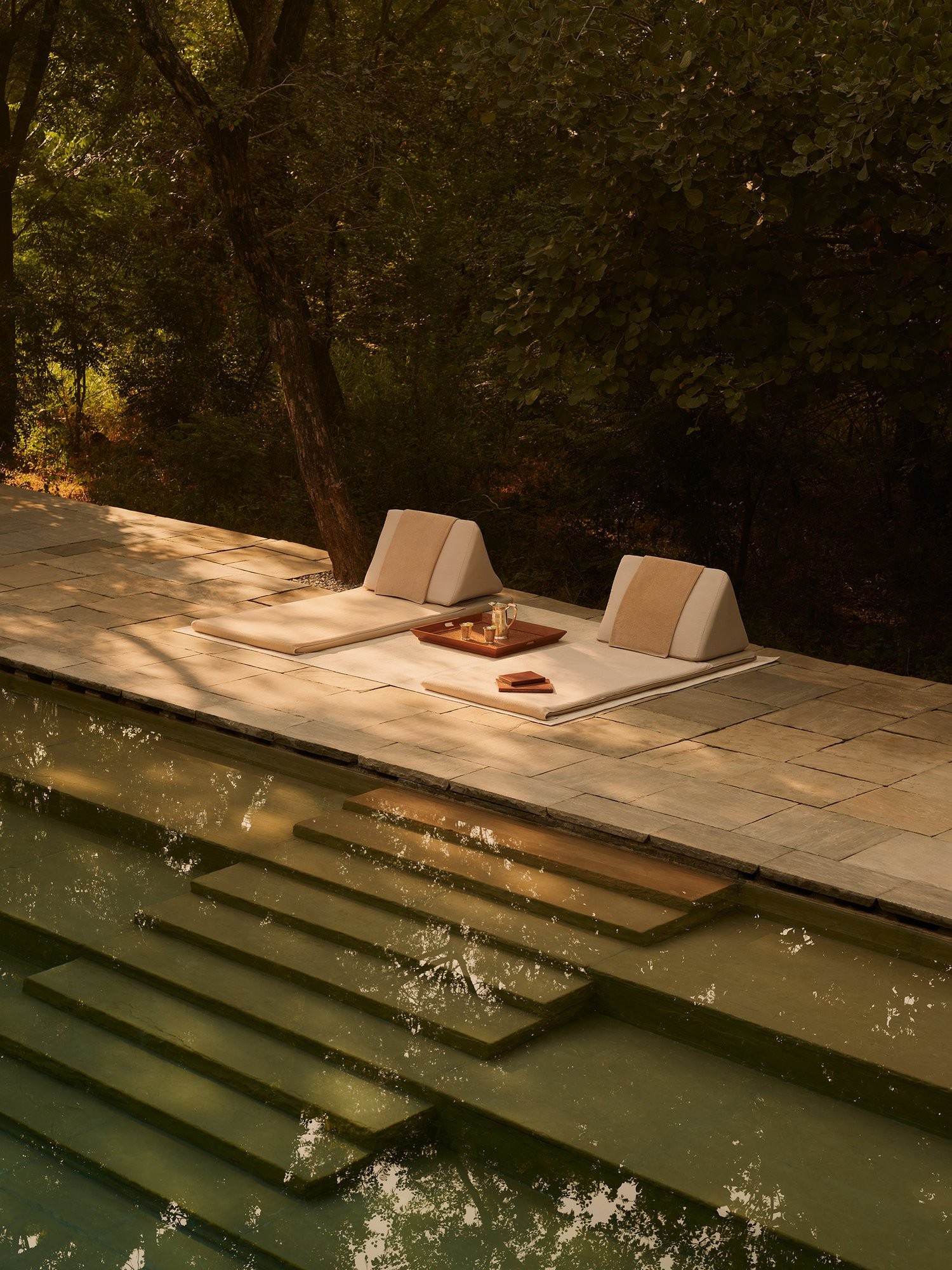 A poolside scene at an Aman hotel in India. Photo by Robert Rieger.