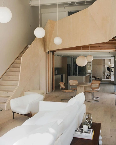 An image added by elizabeth on Oct 14, 2022. May present: table, biscuit company lofts, design, lamp, hardwood.