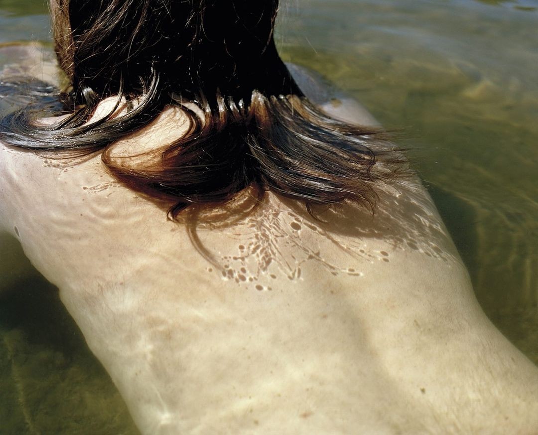 Paul in the water, Block Island, 2011 from Maureen Drennan's series "The Sea that Surrounds Us."
