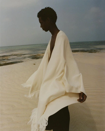 A cover of "Poncho @ Beach" cluster. The owner is peachmagphoto. The cluster consists of 13 elements.