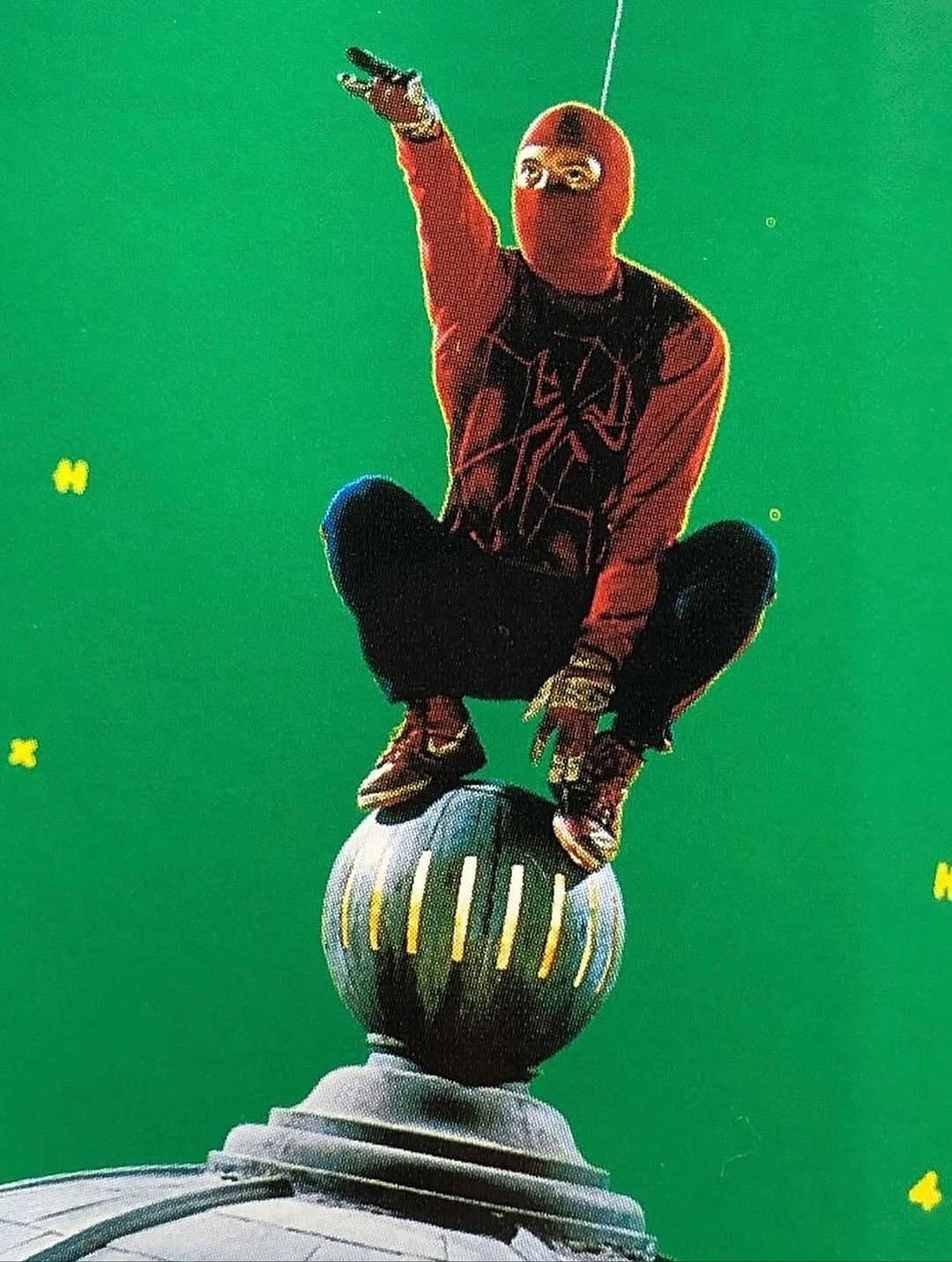 Tobey Maguire as The Human Spider on the set of Sam Raimi's film Spider-Man (2002).