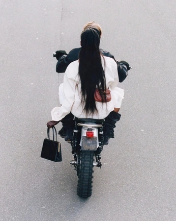 A cover of "skin under city" cluster. The owner is sassy. The cluster description is "shiny skin studio head shots of makeup looks.  fun bts videos ". The cluster consists of 64 elements.