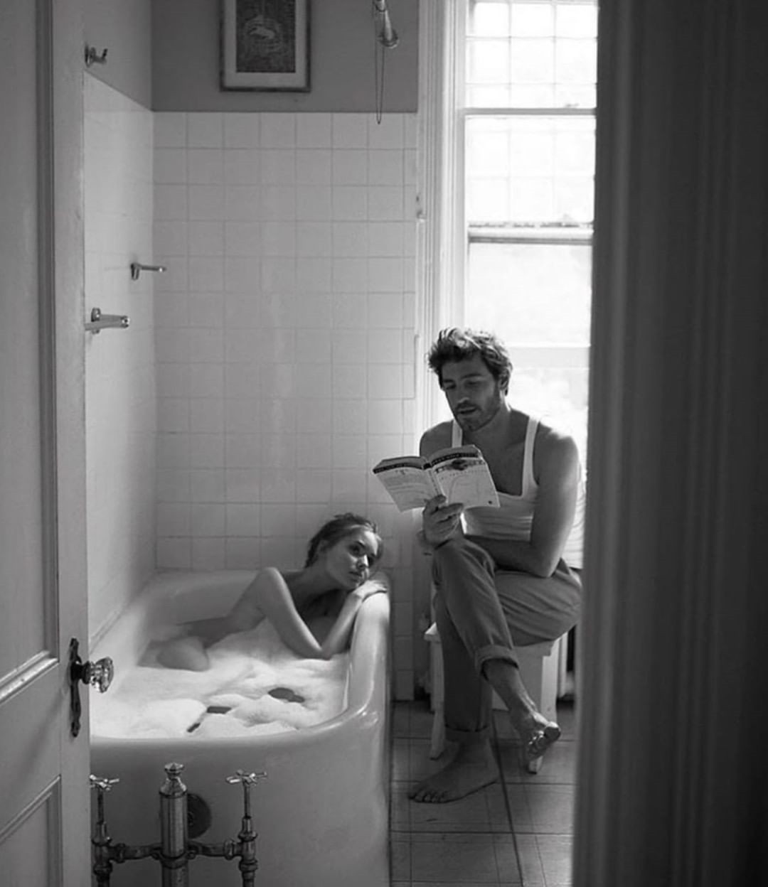 An Instagram  post added by jess on Dec 07, 2021. The author is @poetry.community. May present: style, black-and-white, window, tints and shades, black.