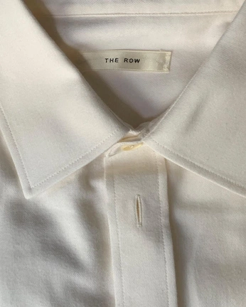 A cover of "Achromic" cluster. The owner is skytyrant. The cluster description is "pristine despite it all". The cluster consists of 17 elements.