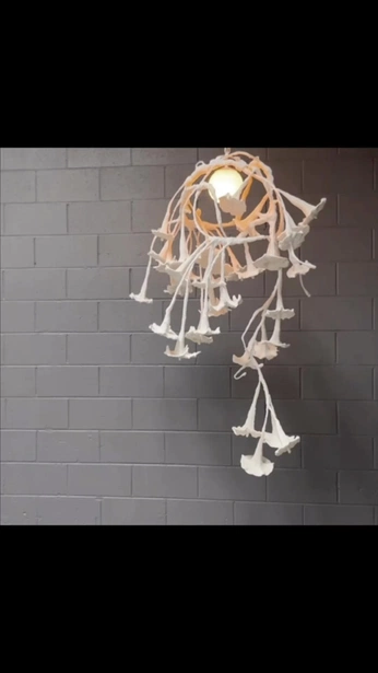 A cover of "Sculptural Lighting" cluster. The owner is omstudio. The cluster description is "Unique Lighting, Sculptural lighting, unique candle holders". The cluster consists of 21 elements.