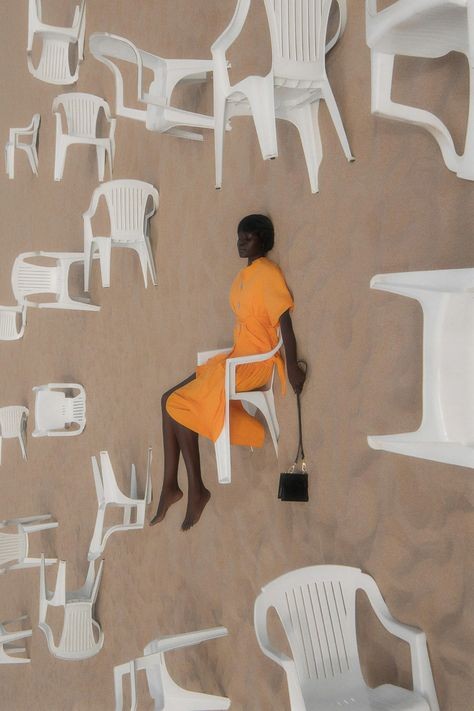 A surrealist composition featuring Monobloc chairs by photographer Abdulla Elmaz.