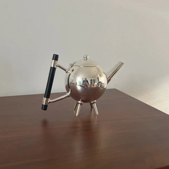 A cover of "Bush Tea" cluster. The owner is styleuncuffed. The cluster description is "tea pictures ". The cluster consists of 51 elements.