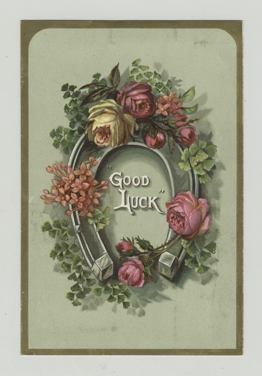 A trade card with the words 'good luck' depicting flowers and a horseshoe.