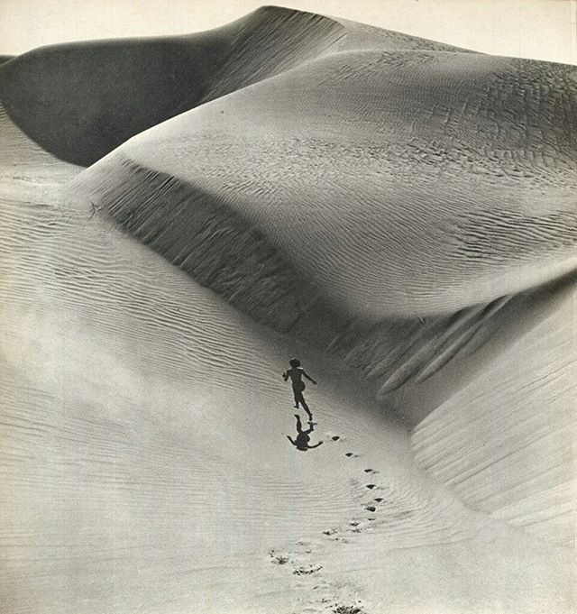 Photograph by André de Dienes titled Around, 1959.