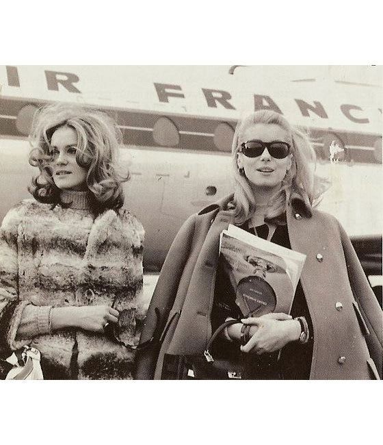 A Pinterest pin added by mbell on Aug 12, 2023. The author is M B. May present: style, black-and-white, happy, sunglasses, travel.