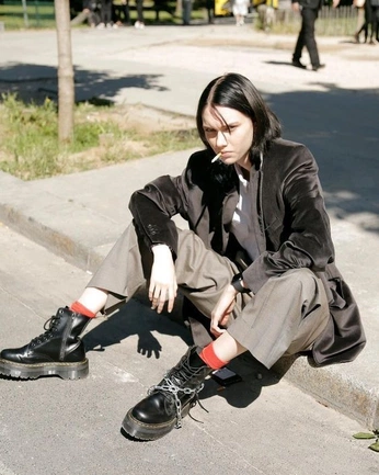 A cover of "TY" cluster. The owner is natfehrenbacher. The cluster description is "grunge, emo, masc. all black.". The cluster consists of 11 elements.