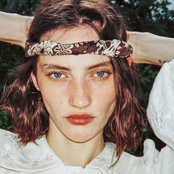 A cover of "PORTIA" cluster. The owner is natfehrenbacher. The cluster description is "vintage sport look, awkward high socks & headband. white and red.". The cluster consists of 14 elements.