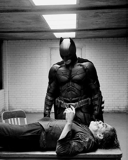 Christian Bale and Heath Ledger on the set of Christopher Nolan's film The Dark Knight (2008).