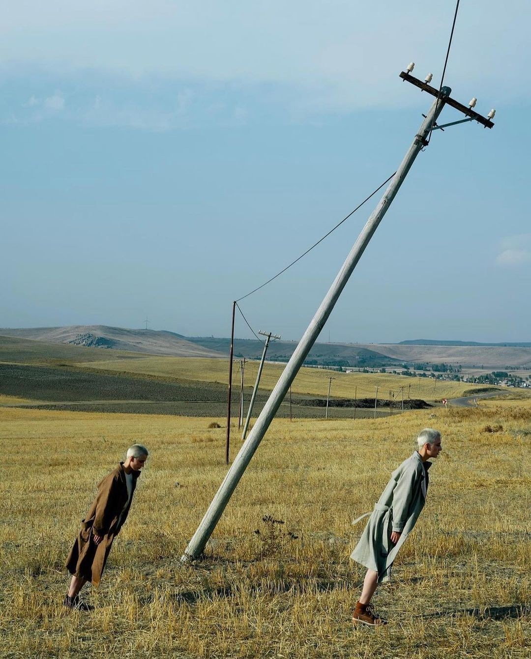 An Instagram  post added by colindancel on Aug 10, 2023. The author is @strike.art. May present: قطّة شرودنجر لسامية العطعوط, erwin schrödinger, sky, cloud, grass.
