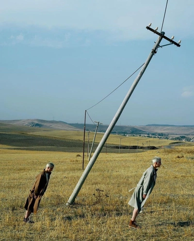 An Instagram  post added by colindancel on Aug 10, 2023. The author is @strike.art. May present: قطّة شرودنجر لسامية العطعوط, erwin schrödinger, sky, cloud, grass.