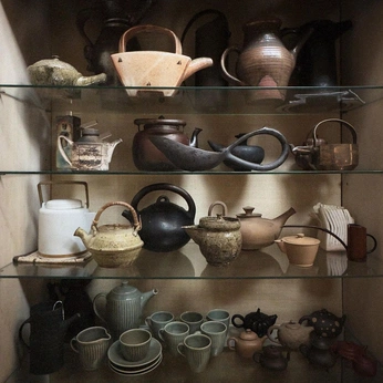 A cover of "TEA VIBES" cluster. The owner is noone. The cluster description is "Warm chai and vessels that hold it.". The cluster consists of 22 elements.