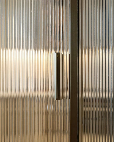 A fluted glass door. Photo by UC | Design & Photography. / Cosmos