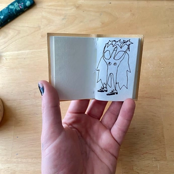 A cover of "zine 1 - humour" cluster. The owner is isabellepateman. The cluster consists of 4 elements.