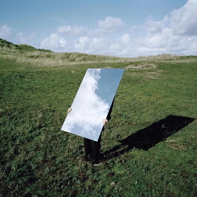 An Instagram carousel post added by cosmos on Jul 18, 2023. The author is @atmos.