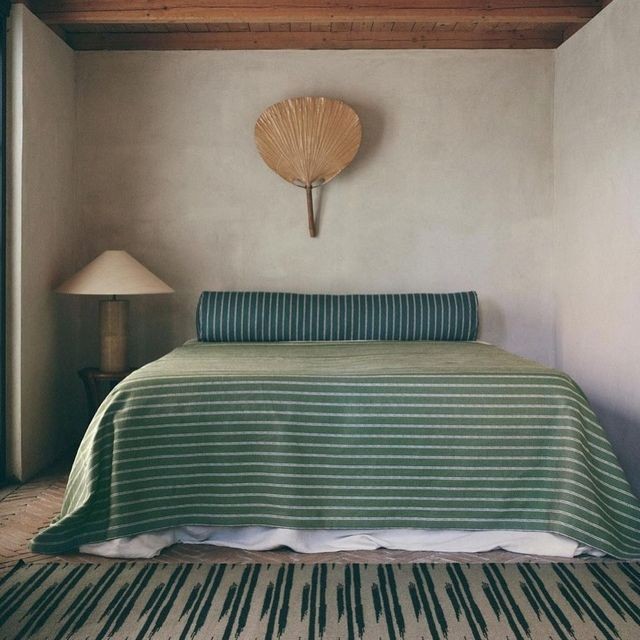 A bedroom interior by Campbell Rey with Ribbon Fabric by Helene Blanche. Photo by Heidi Lerkenfeldt.