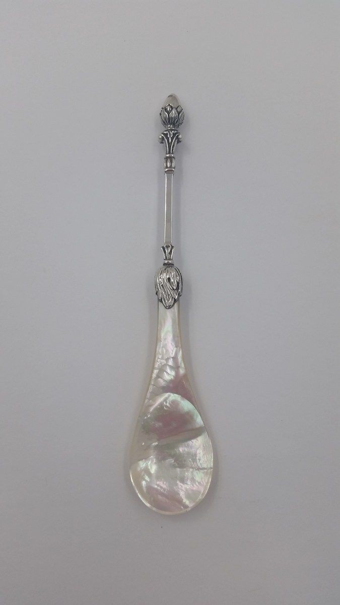 A Mother Of Pearl Caviar Spoon.