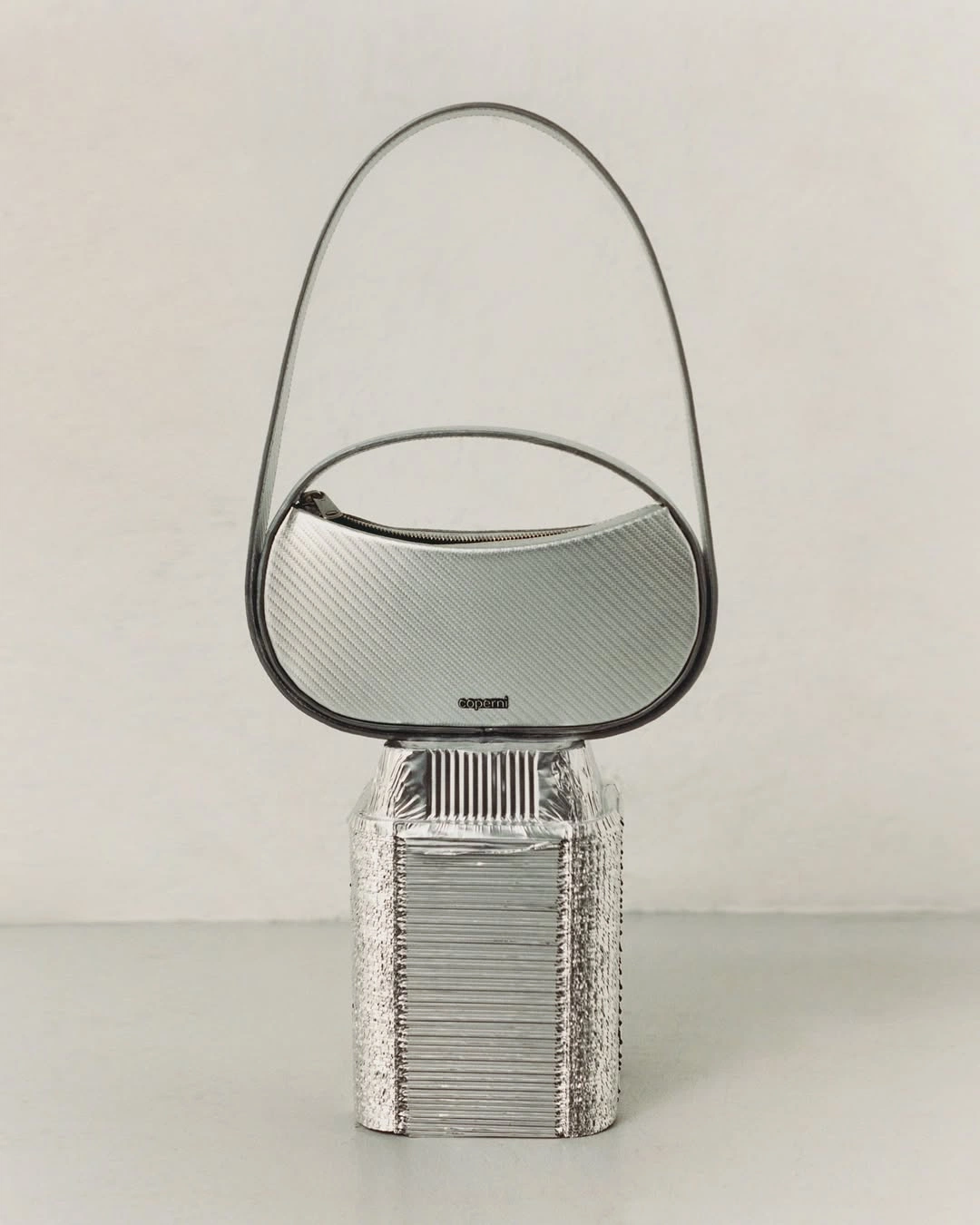 Chrome metallic handbag fashion accessory