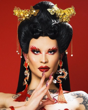 A cover of "Year of the DRAGon" cluster. The owner is marksavant. The cluster description is "lookbook for lunar new year finery". The cluster consists of 24 elements.